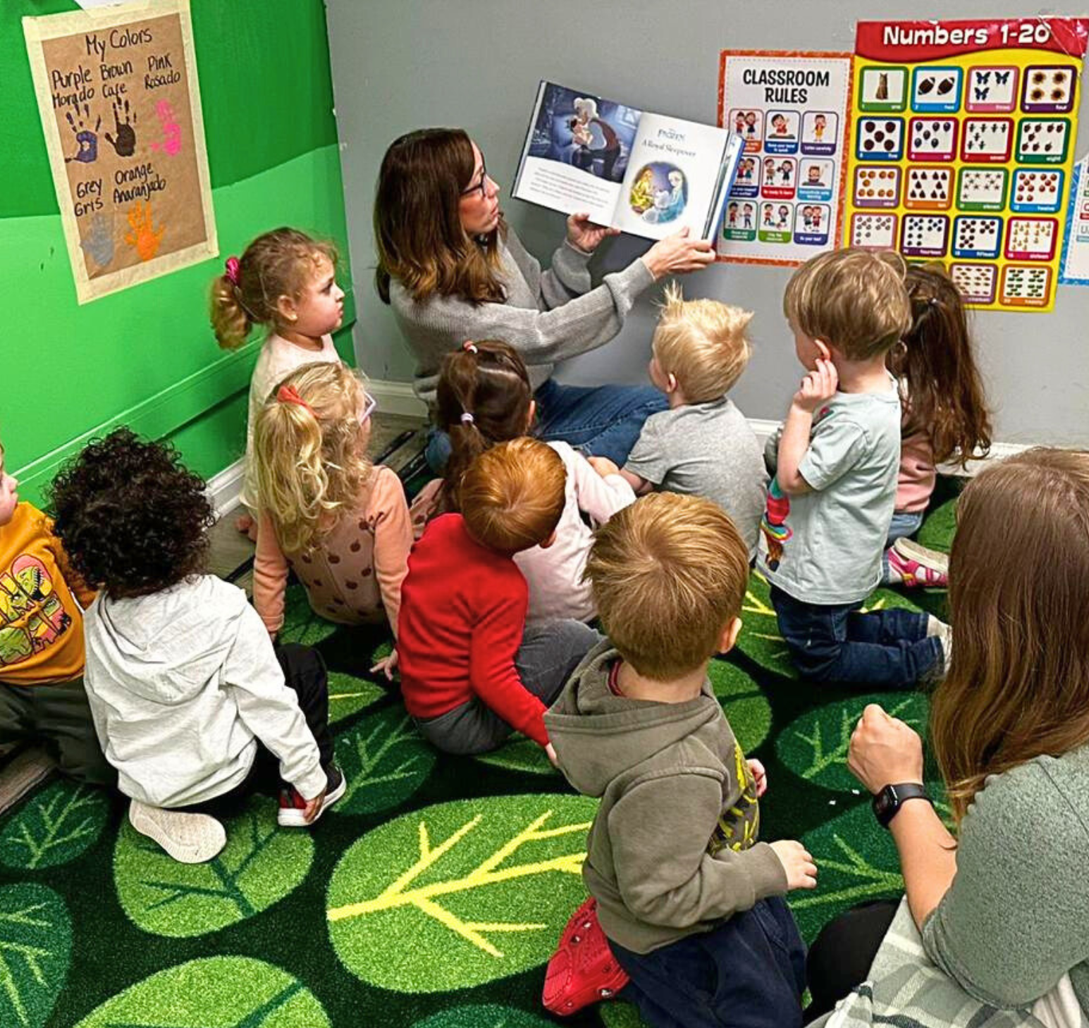 Children reading in classroom at Little Geniuses Learning Center